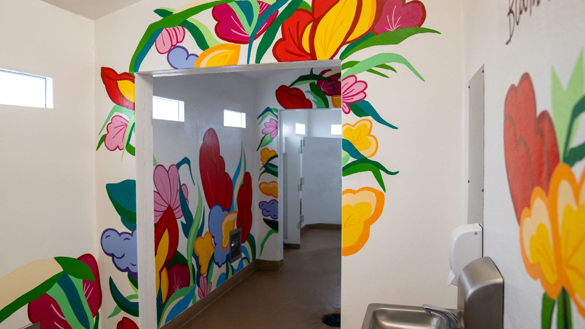 Floral artwork mural on bathroom walls
