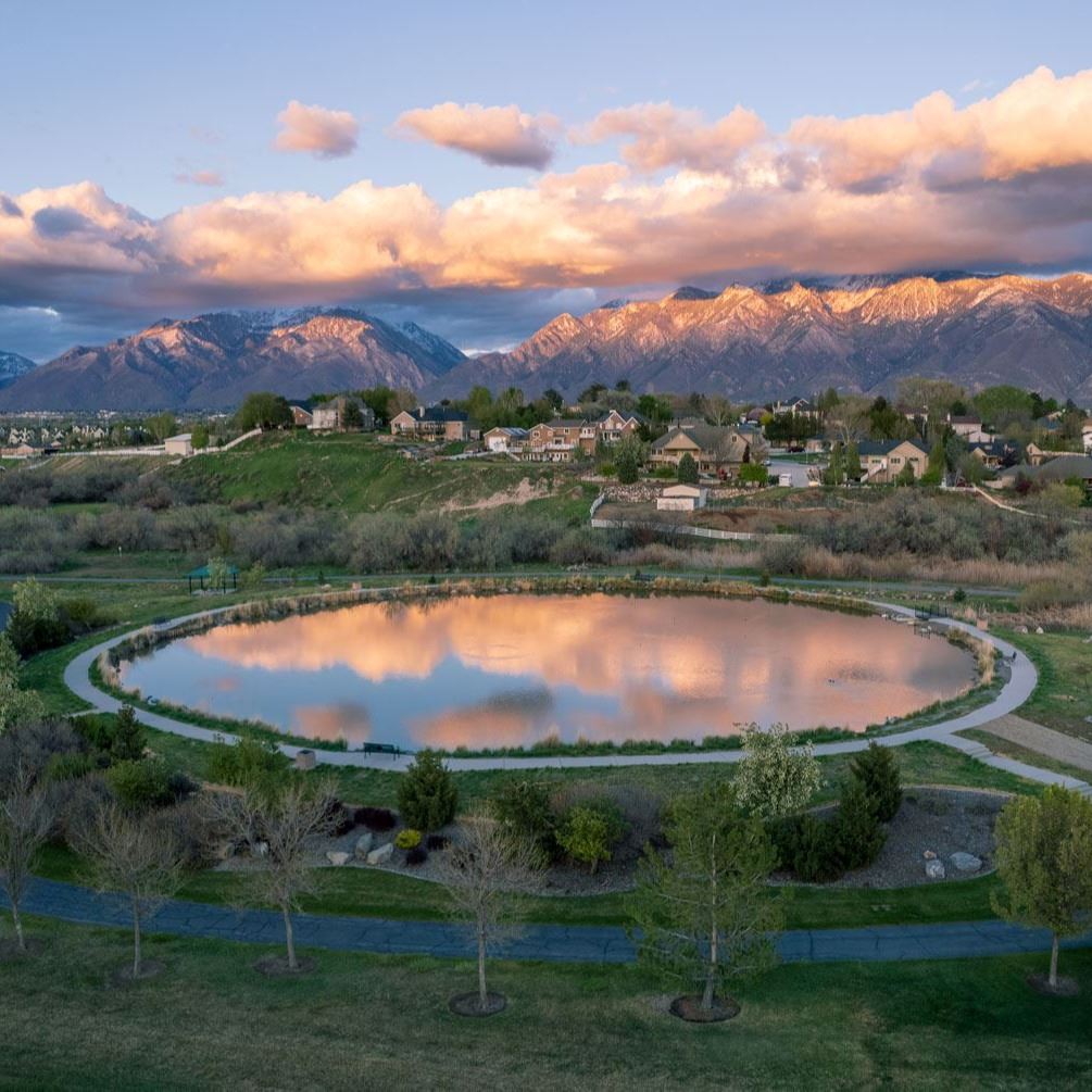 sunset over the fishing ponds in south jordan